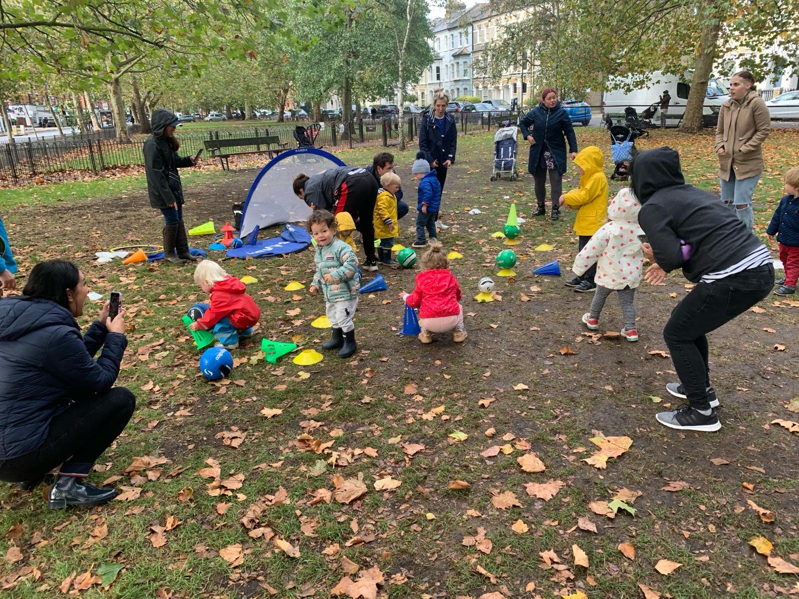 Nursery sessions outside activities with coach, students, and parents